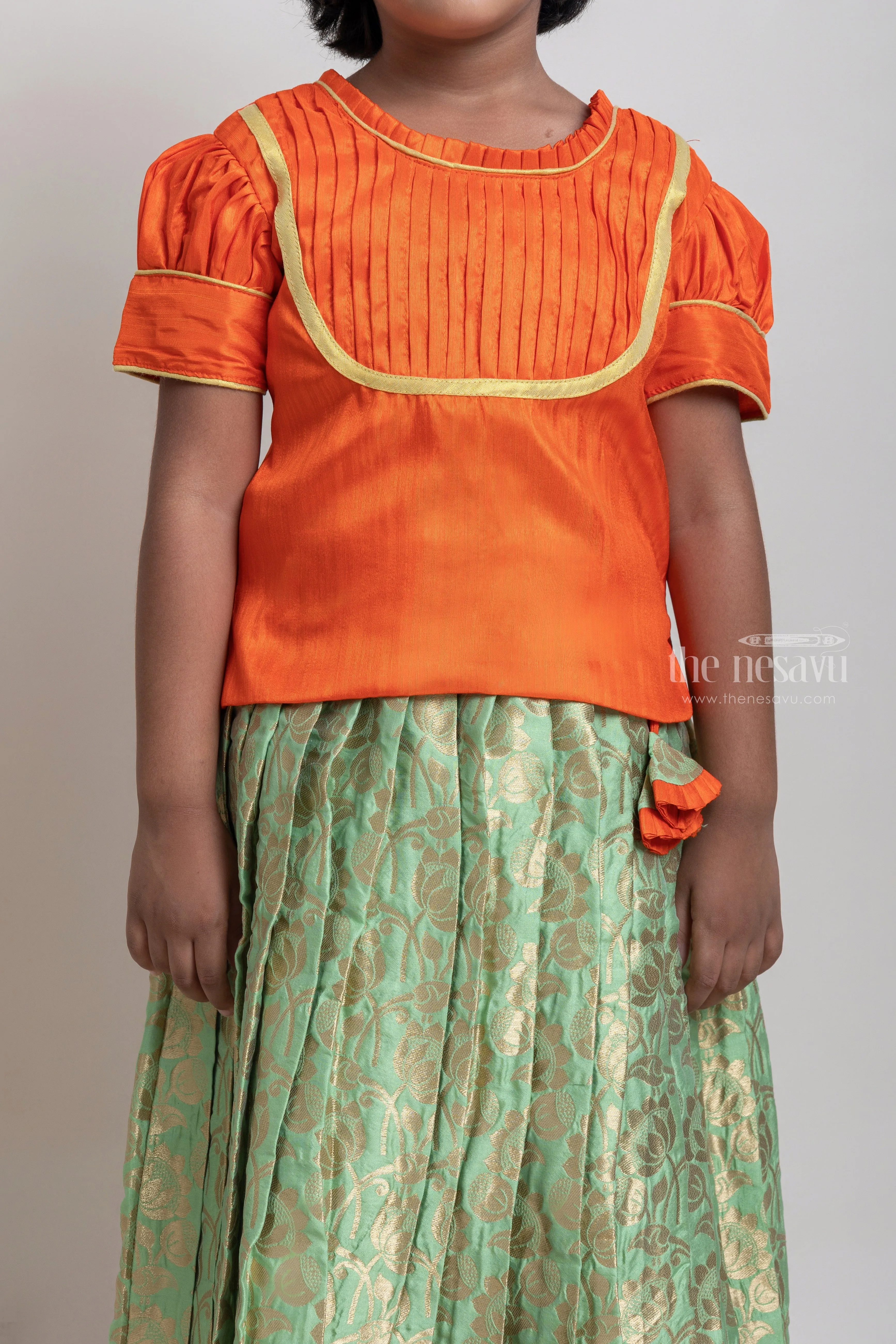 Beautiful Traditional Orange Silk Blouse With Green Pleated Designer Pattu Pavadai